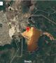Ярко оранжев пейзаж в околностите на мина близо до село Левиха в Урал. Водата, смесвайки се под земята с медния пирит, който има високо съдържание на сяра, образува смес от сярна киселина с голямо количество мед и други метали. И всичко това изтича. Сега водата от мината се разлива на повърхността, създавайки космически пейзажи. <br>Снимка : google maps